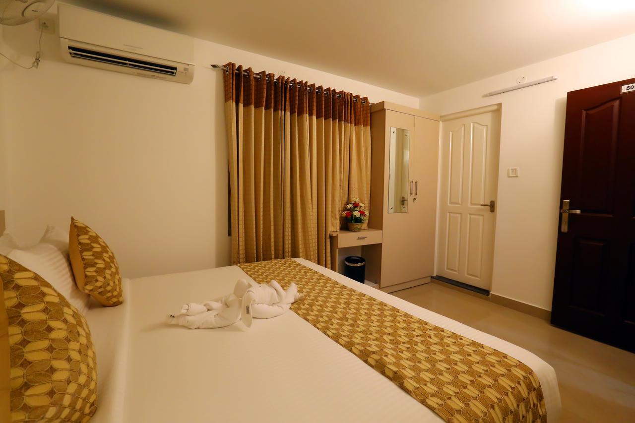 Hotel Swarna Residency Kochi Extérieur photo